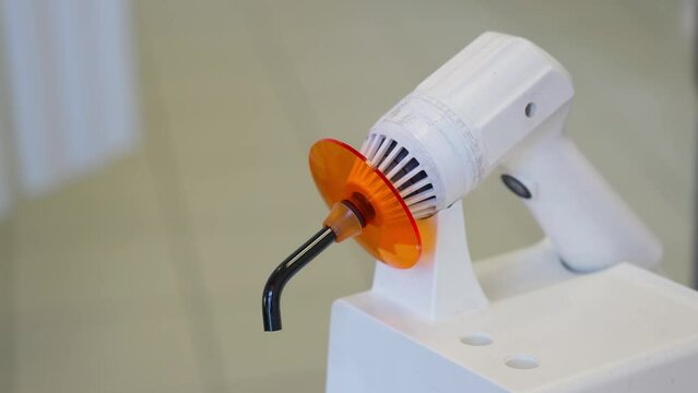polymerizing lamp in the dentist's office. ice lamp for drying dental fillings