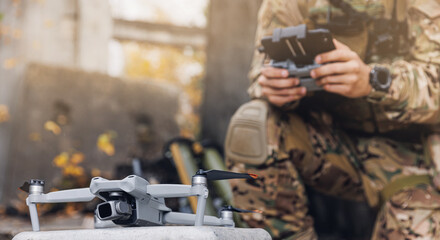 Soldier engineer army is preparing to launch modern drone for military reconnaissance, artillery guidance and surveillance operation - obrazy, fototapety, plakaty