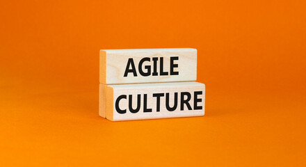 Agile culture symbol. Concept words Agile culture on wooden blocks. Beautiful orange table orange background. Business flexible and agile culture concept. Copy space.