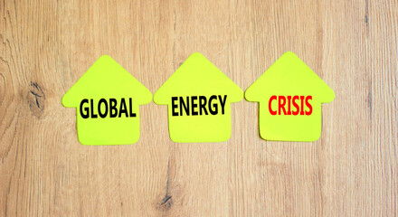 Global energy crisis symbol. Concept words Global energy crisis on papers on wooden clothespins. Beautiful wooden background. Business and global energy crisis concept. Copy space.