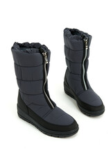 Long women's boots. On a white background. side view.