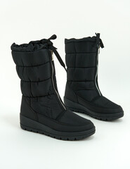 Long women's boots. On a white background. side view.