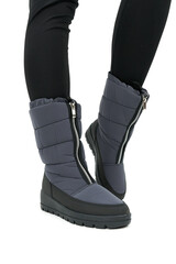 legs in gray shoes isolated on white background