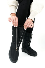 legs in black shoes isolated on white background