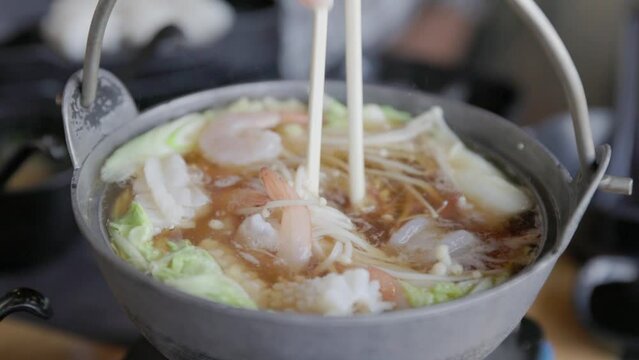Hotpot shabu shabu full with vegetable meat seafood. Japanese asian food concept