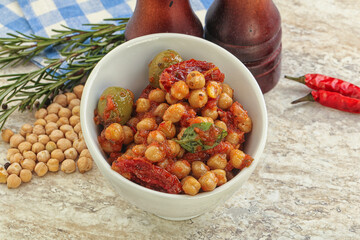 Chickpea beans with dry tomato and olives