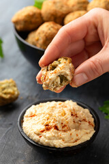 Middle Eastern vegetarian vegan chickpea and coriander falafels served with hummus