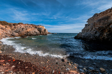 Fototapeta na wymiar The cave of the Sea Lion and its cove on the island of Tabarca in the Spanish Mediterranean