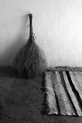 hand woven classic carpet and handmade grass broom, classic village household items,