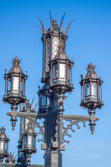 Fototapeta na wymiar Street lamp in Gothic style. Ancient city