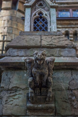 Antiquity in detail. Decoration of houses, balconies, windows, sculptures, walls. Elements of architectural design of buildings. Old plaster, Stone decorations. Elements of Gothic architecture