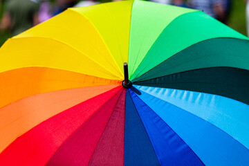 Umbrella painted in a spectrum. Umbrella in rainbow colors.