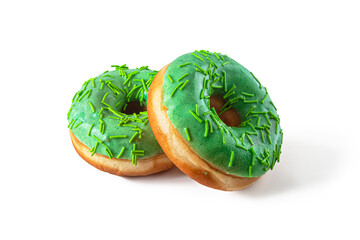 Two donuts with green glaze on a transparent background