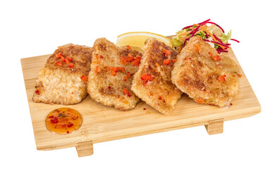 Fried fish fillets with  salad.