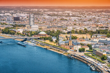 Fototapeta premium Aerial cityscape view of recognizable architectural landmarks of the city of Dusseldorf and Rhine River