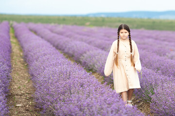 Happy girl in the lavender field.