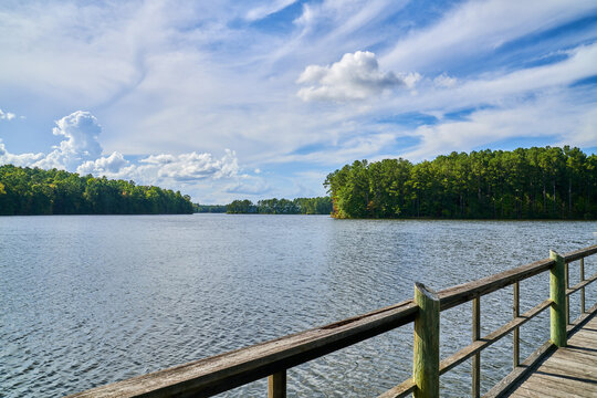 Wooden pier on lake McIntosh in Peachtree City Georgia.