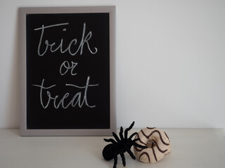 Trick and treat background painted on a blackboard 