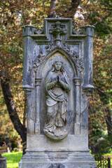 Historic Statue on the mystery old Prague Cemetery, Czech Republic