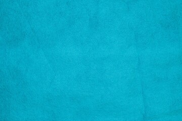 Abstract blue background from synthetic fabric.