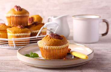 Pumpkin muffins with cream cheese filing