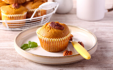 Pumpkin muffins with cream cheese filing