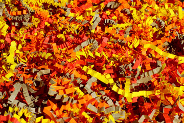 paper multi colored filler. Paper strips filler for gift wrapping. Holiday celebration background, selective focus