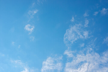 White clouds in a high blue sky