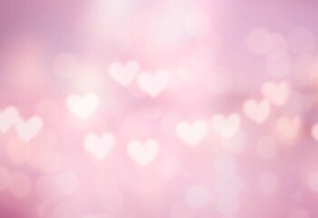Fototapeta premium Pink blurred hearts texture. Valentine's background. Romantic backdrop.