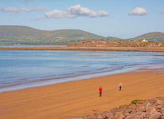 person walking on the beach