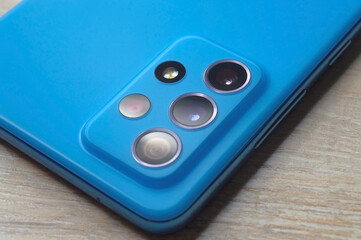 camera lenses on the back cover of the smartphone. close-up