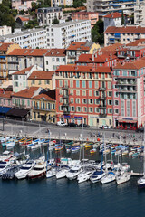 Fototapeta na wymiar Nice, France - 25.09.2022: View of Nice and its port from Mont Boron park