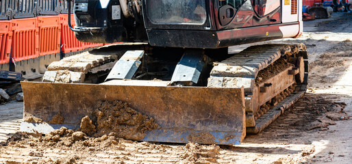 Detail of industrial excavator working on construction site