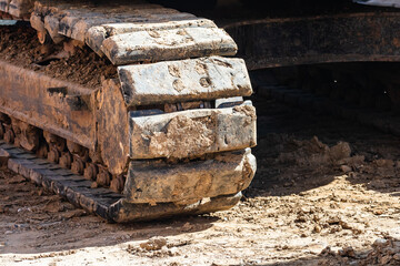 Detail of industrial excavator working on construction site