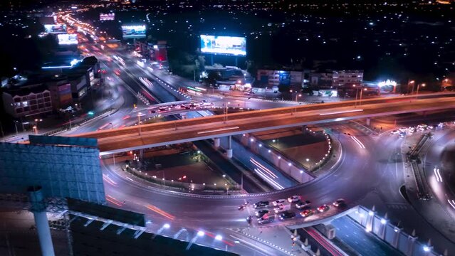 HyperLapse Of Traffic On City Streets At Night. Aerial View
