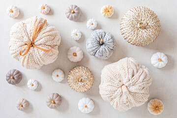 Hobby background with handmade pumpkins. DIY, craft decoration for fall and winter holidays. Flat lay, top view, banner