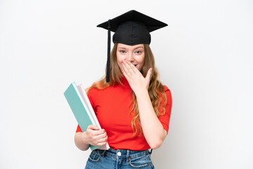 Young university graduate woman isolated on white background happy and smiling covering mouth with hand