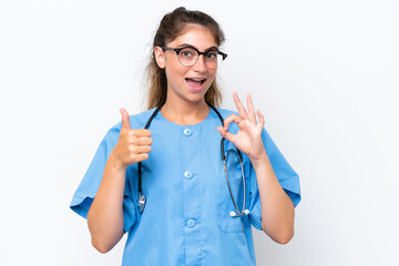 Young nurse doctor woman isolated on white background showing ok sign and thumb up gesture