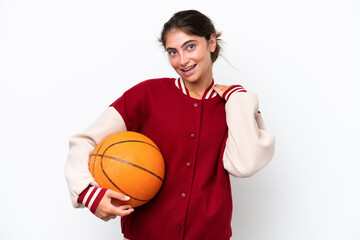 Young basketball player woman isolated on white background laughing
