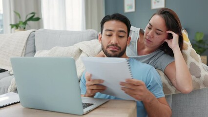 Savings, investment and finance planning with a couple reading paperwork at home with a laptop. Money, growth and banking with a young man and woman thinking about the future in their living room - Powered by Adobe