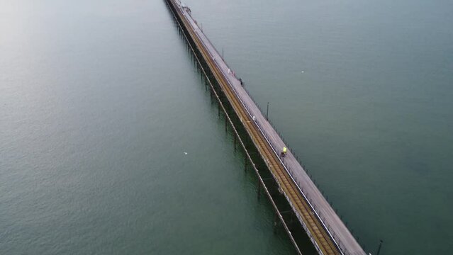 Scenic drone (aerial) footage of Southend-on-Sea pier on a summer day.