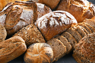 Assorted bakery products including loafs of bread and rolls