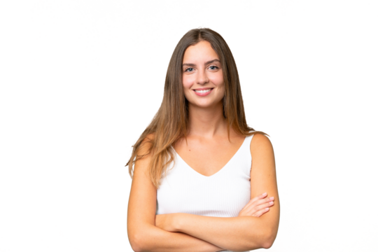 Young pretty woman over isolated background keeping the arms crossed in frontal position