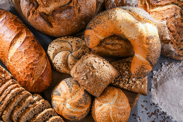 Assorted bakery products including loafs of bread and rolls