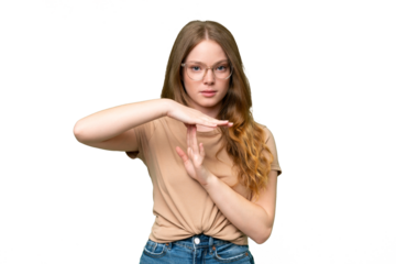 Young pretty woman over isolated background making time out gesture