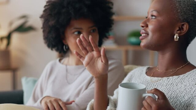 Coffee break, girl talk and friends on the sofa with woman listening to story with trust, love and care. Gen z women on the couch in living room with tea or espresso for social or gossip conversation