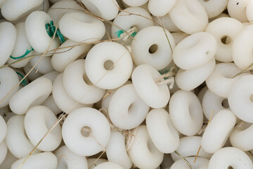 close up of white fishing net floats