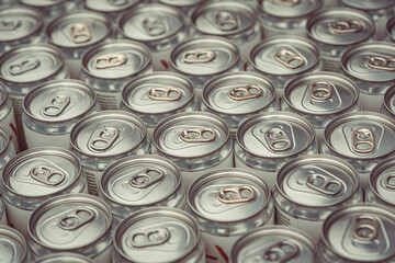Bunch of aluminum beverage cans , vertical image.