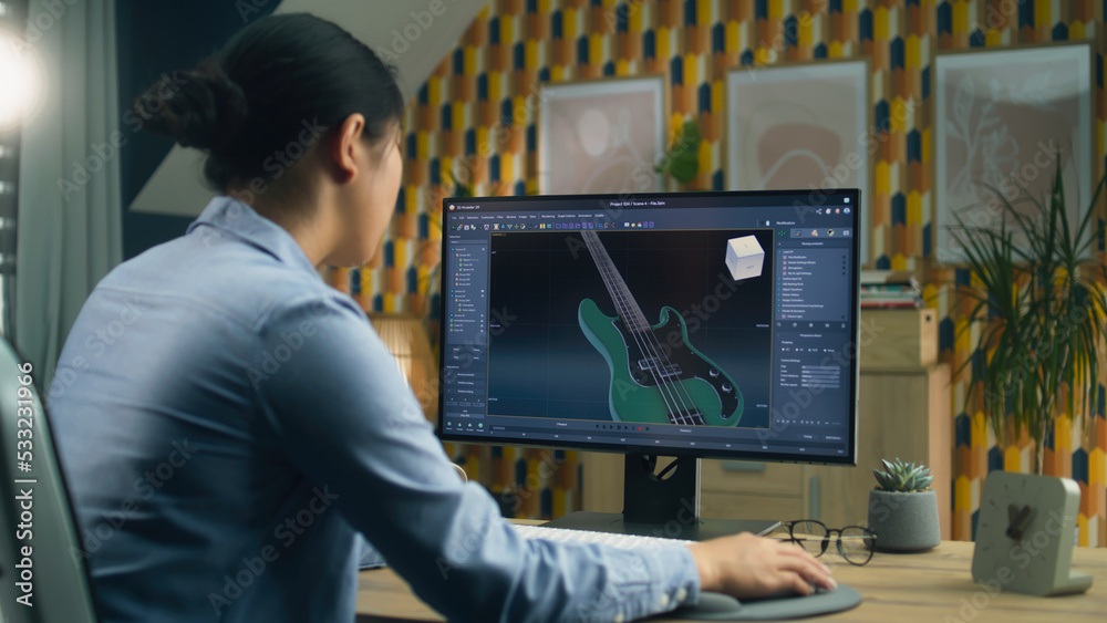 Poster woman designing 3d prototype of electric guitar using modern personal computer with 3d modeling prog