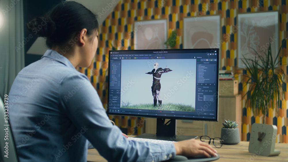 Poster Asian female 3D designer making animation for video game character using modern computer with software for creating 3D modeling projects